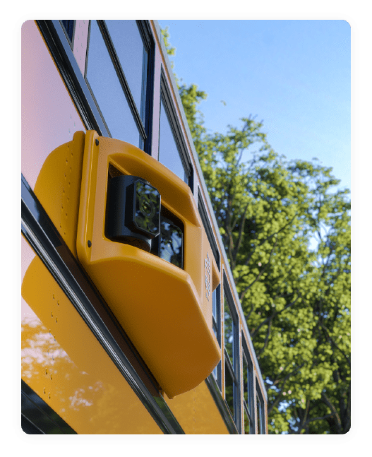 image of a safety camera on the side of a school bus.