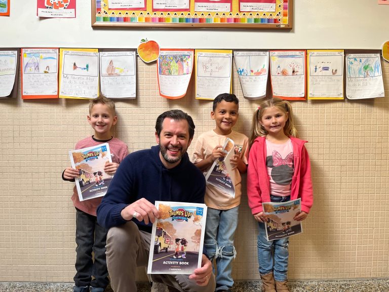 Teacher with his students.