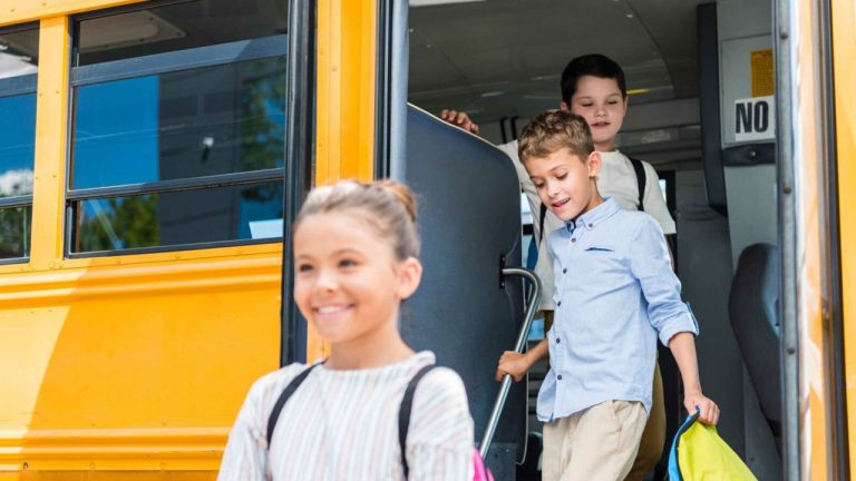 Students exiting a school bus.