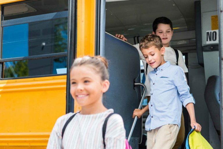 Students exiting a school bus.