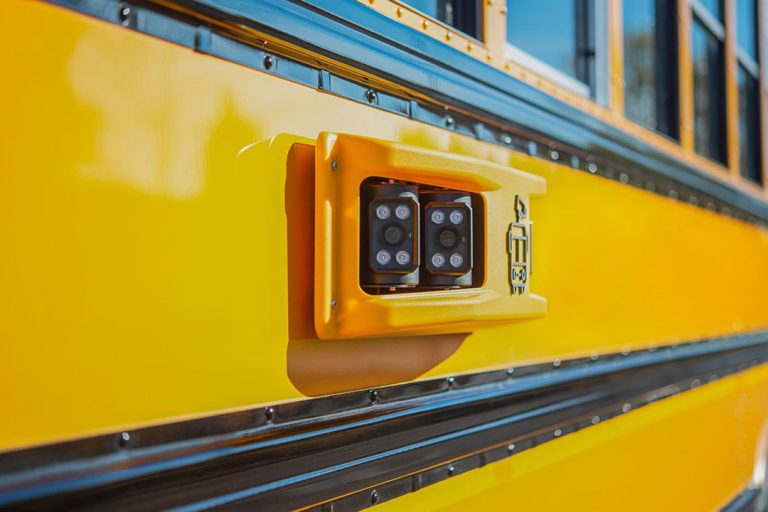 Stop-arm camera on school bus.