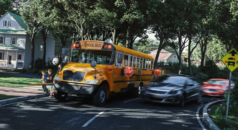 Students exiting the school bus while cars speed by in the road